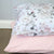 Two pillows sitting on top of each other. The bottom one is Duchess, and the top is Nottingham.